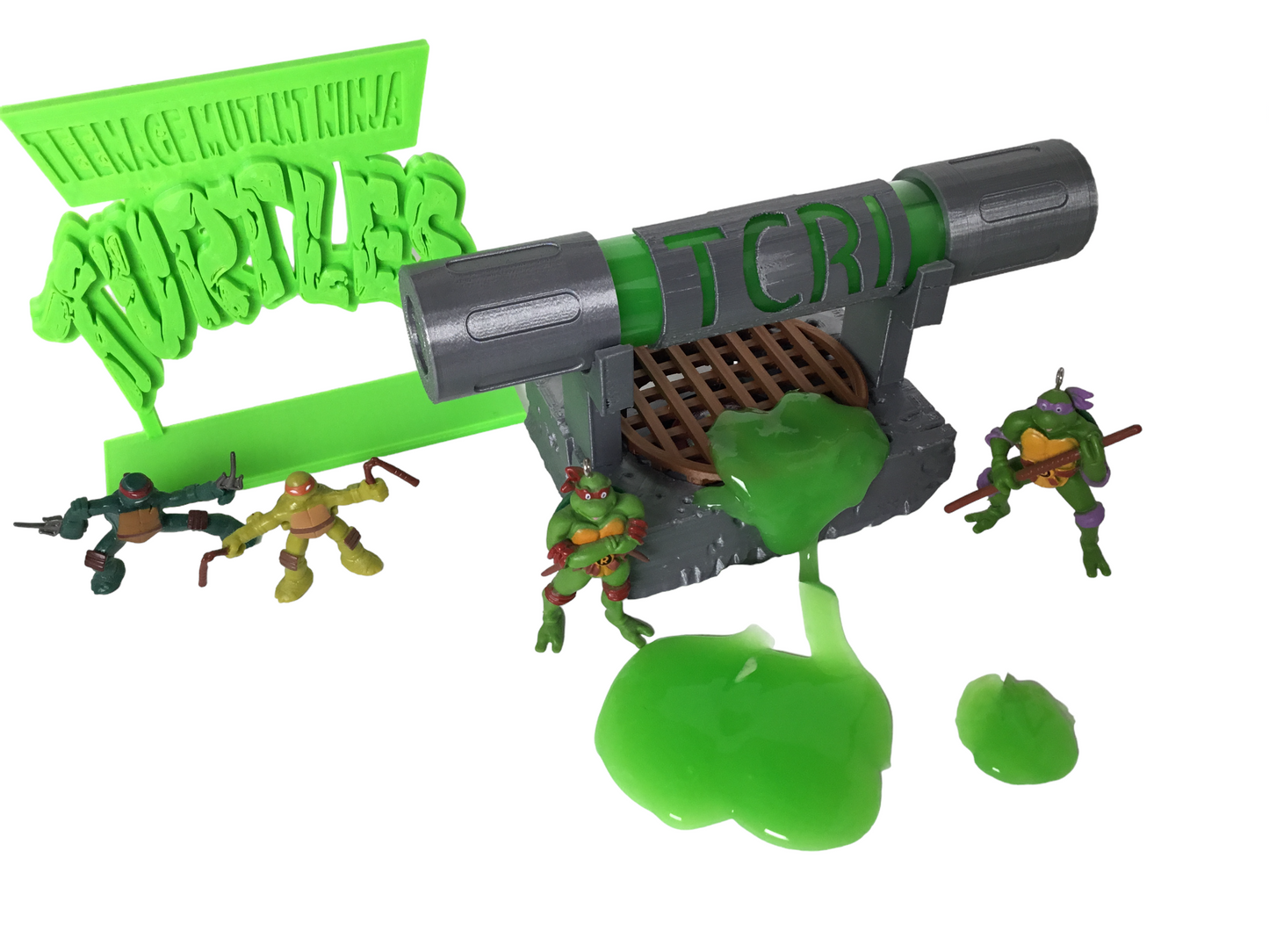 Teenage Mutant Ninja Turtles TCRI Mutagen Ooze Canister, Sign & Light up display