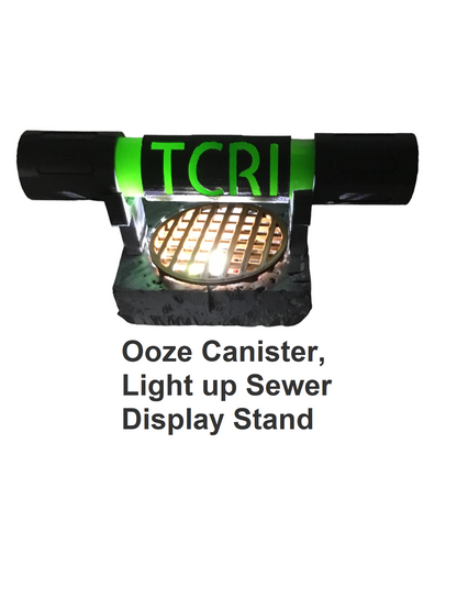 Teenage Mutant Ninja Turtles TCRI Mutagen Ooze Canister, Sign & Light up display