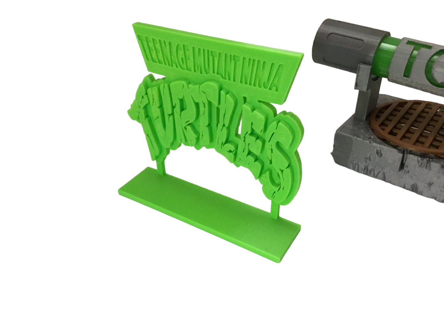Teenage Mutant Ninja Turtles TCRI Mutagen Ooze Canister, Sign & Light up display